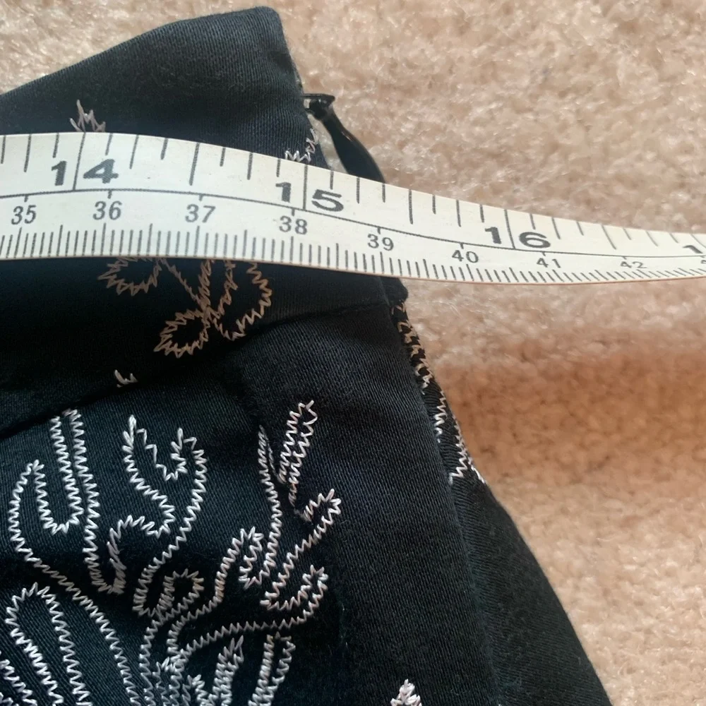 Gianni Bini black skirt with embroidery. Size 6.